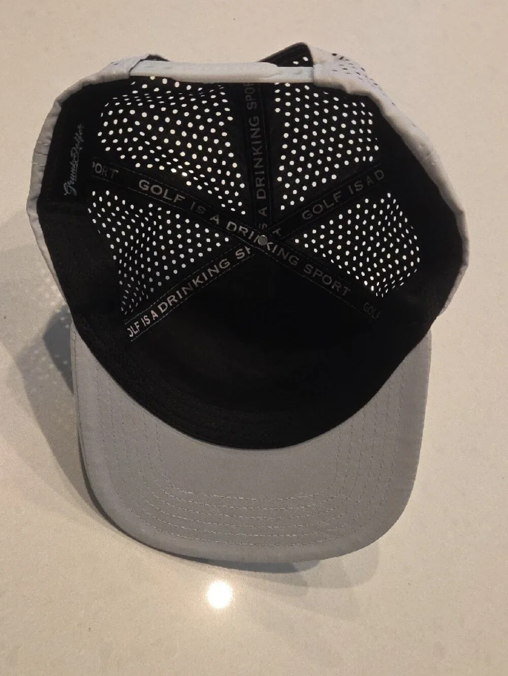 Grunk Dolfer Golf Cap with Green Script  Embroidery